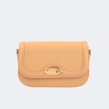 Beige handbag with a gold clasp on a light gray background | Vogelle
