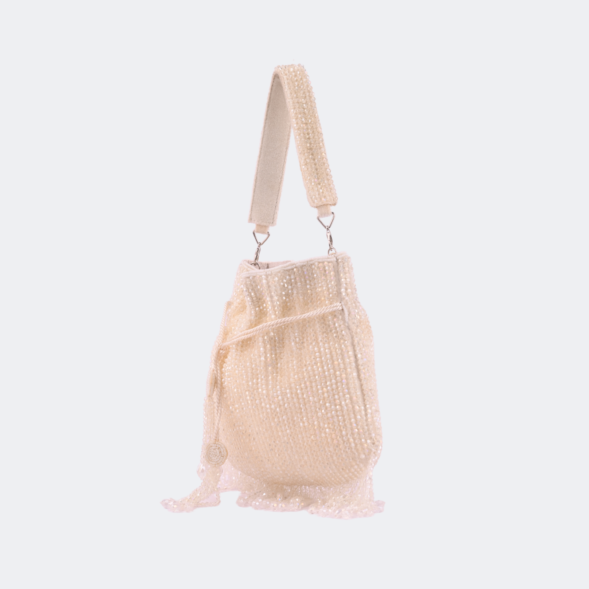 Beige handbag with a textured strap on a light gray background | Vogelle