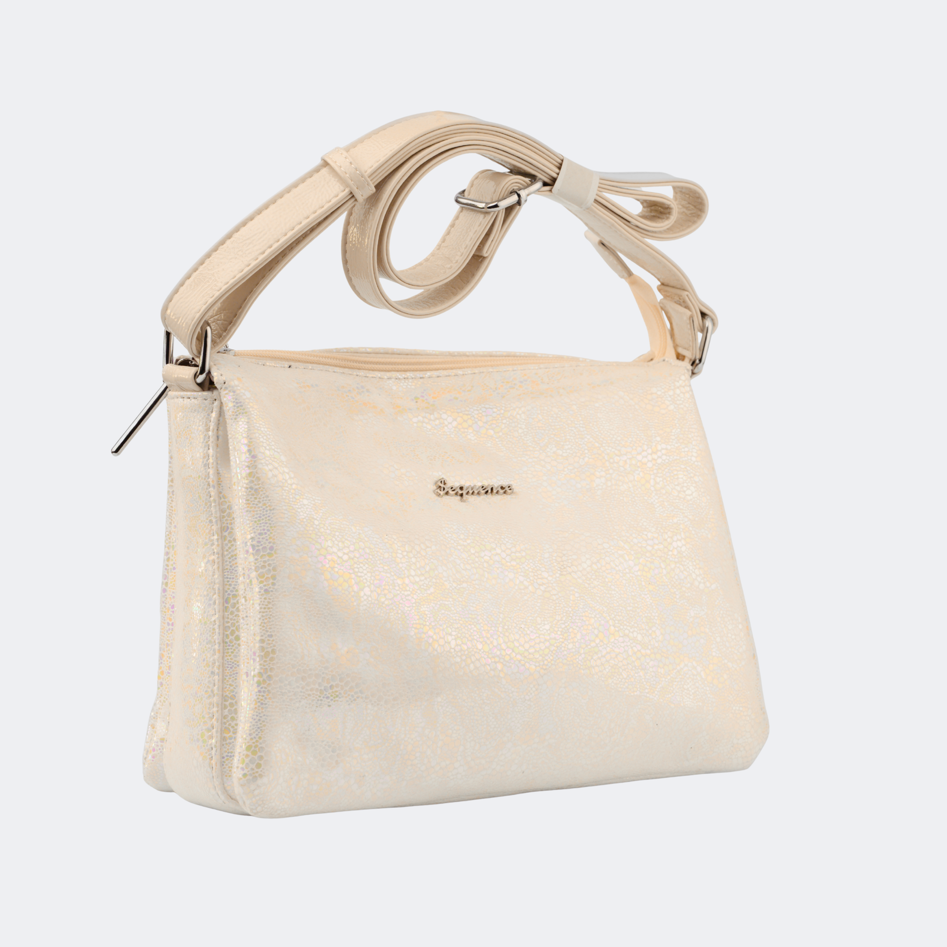 Beige handbag with decorative handle on a light gray background | Vogelle