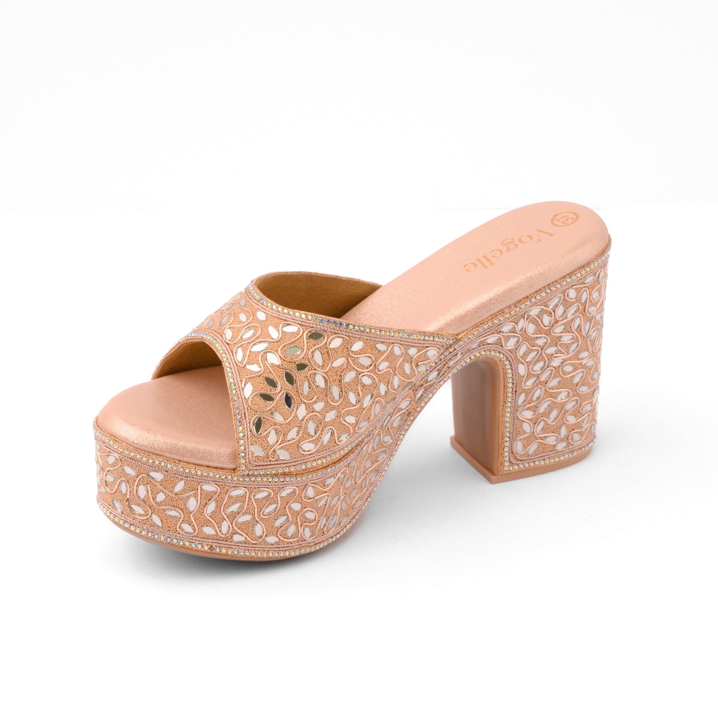 Beige high-heeled sandal with intricate cut-out design on a white background | Vogelle