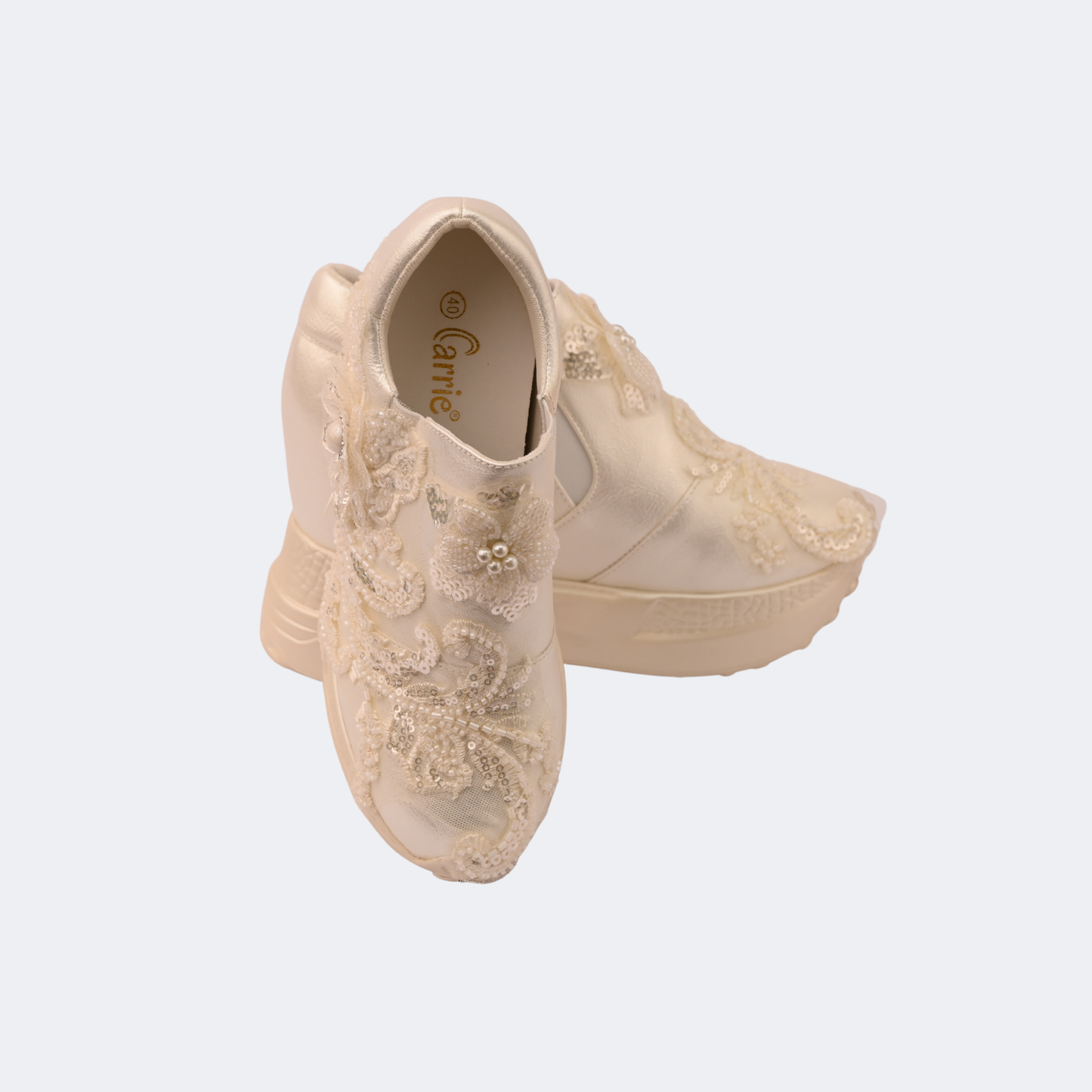 Beige lace-up shoes on a light gray background | Vogelle