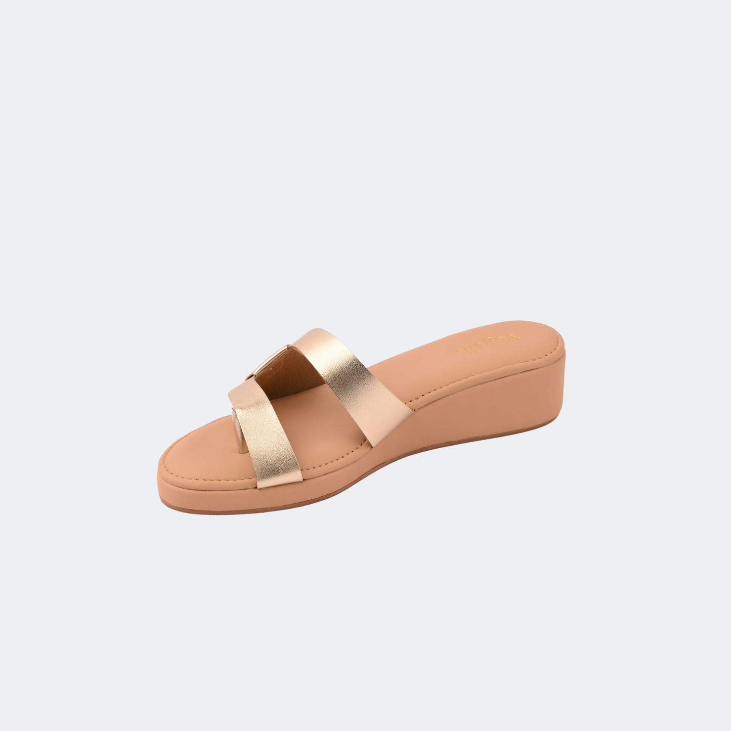 Beige sandal with gold straps on a light gray background | Vogelle