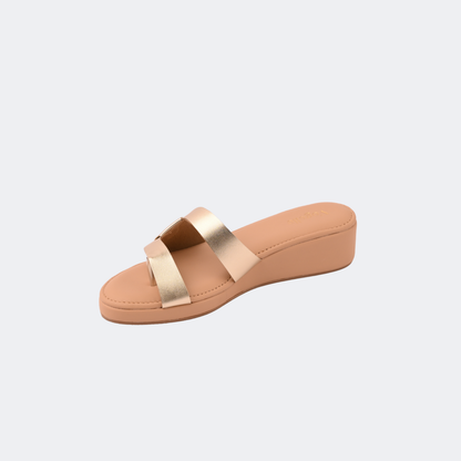 Beige sandal with gold straps on a light gray background | Vogelle