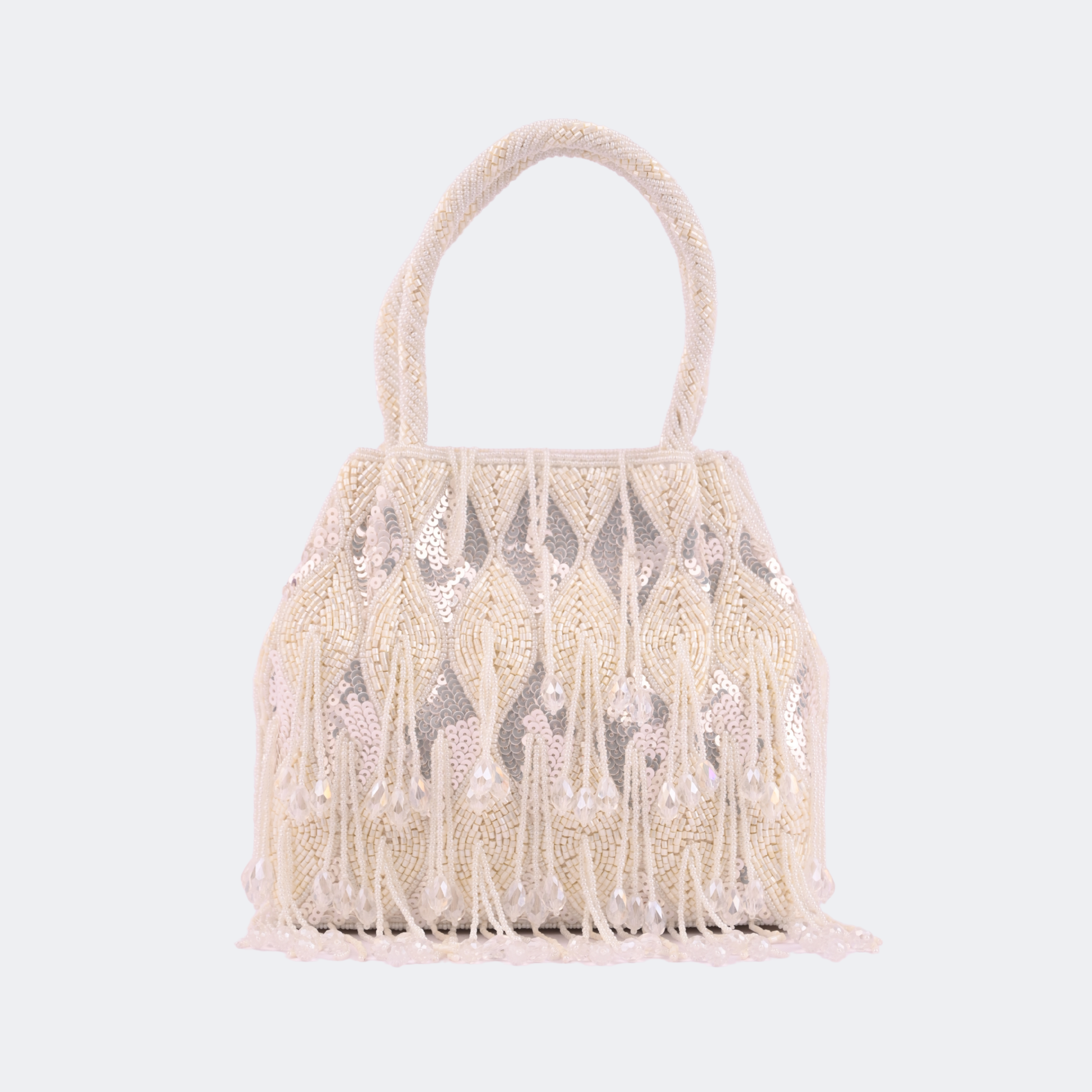 Beige handbag with fringe details on a light gray background Vogelle
