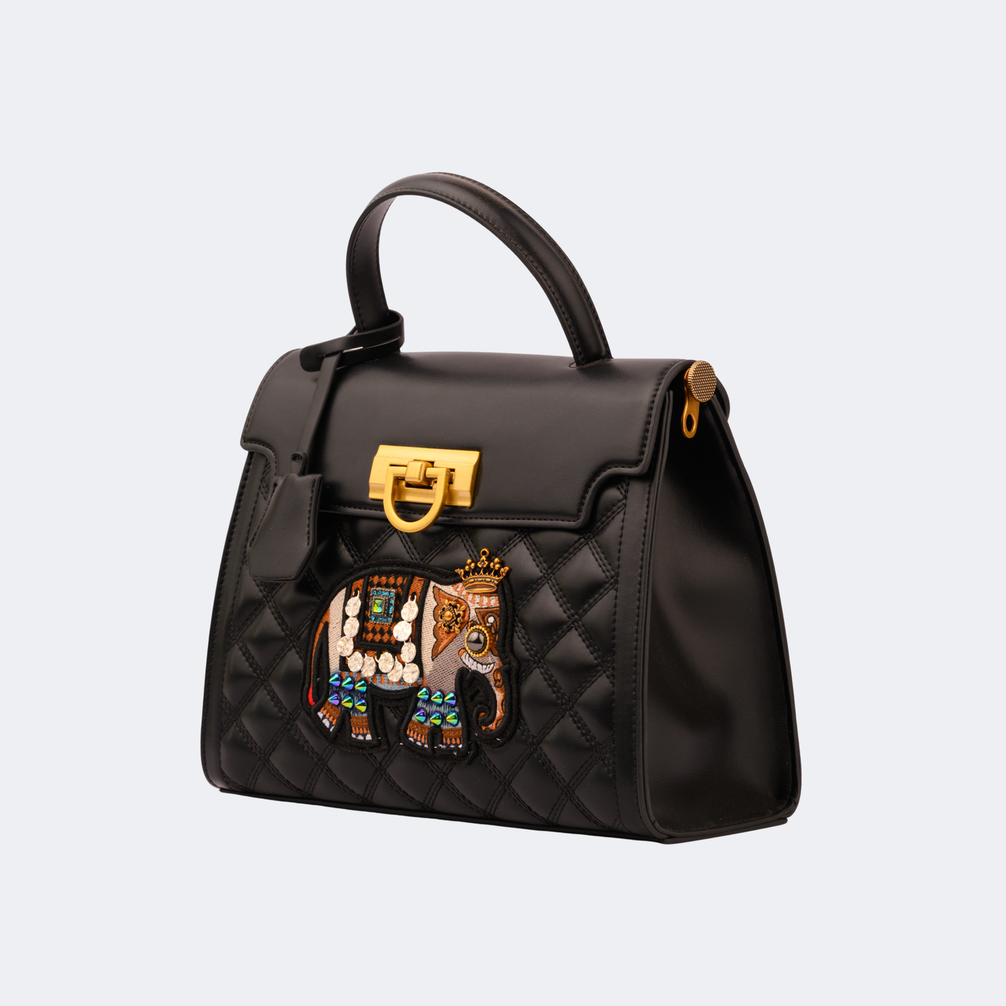 Black handbag with a decorative elephant emblem on a light gray background | Vogelle