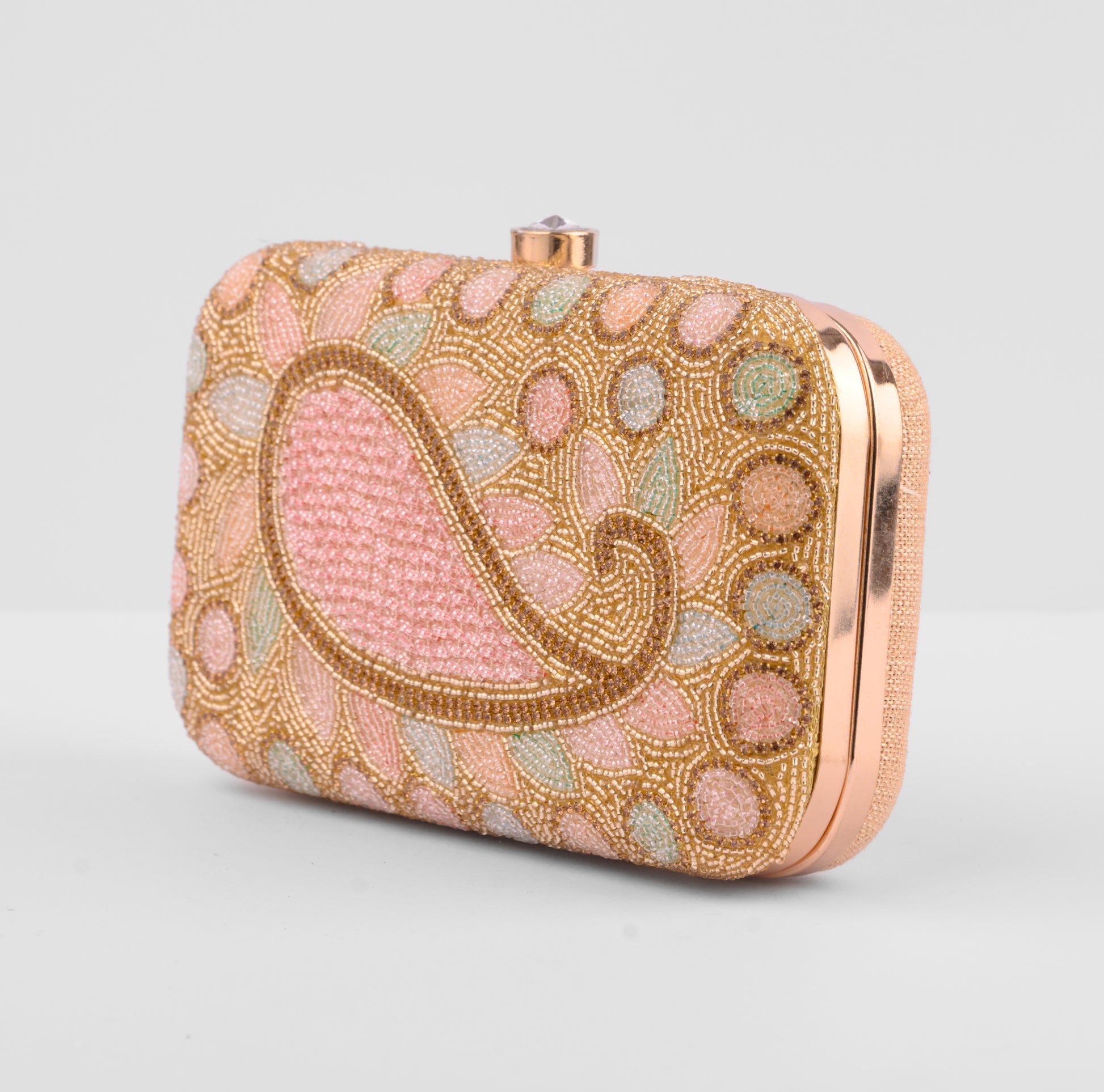 Decorative clutch bag with intricate beadwork on a light gray background | Vogelle