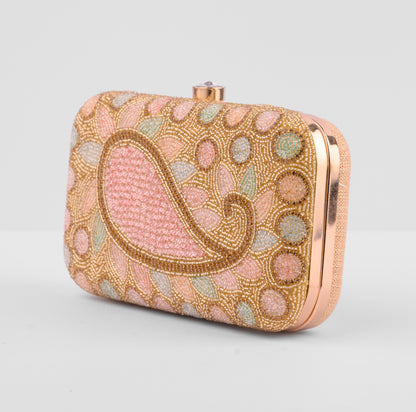 Decorative clutch bag with intricate beadwork on a light gray background | Vogelle