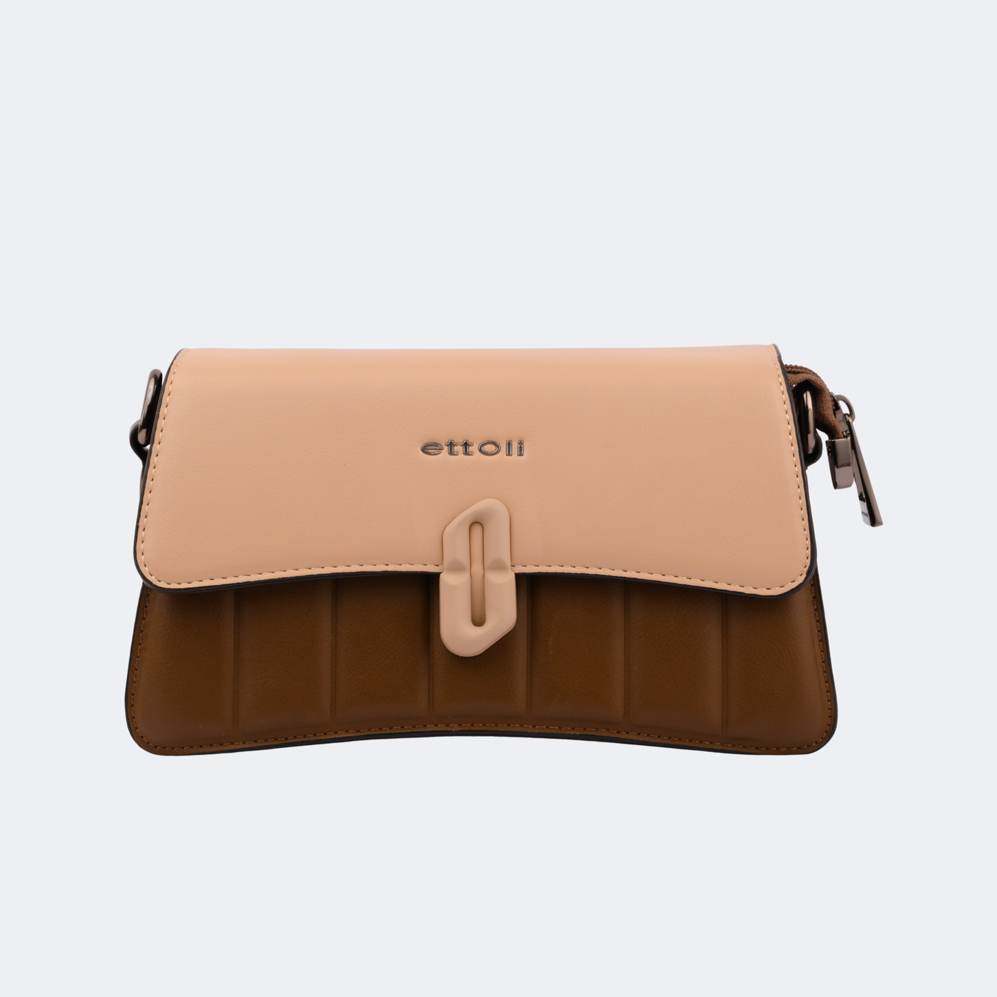 Two-tone brown and beige handbag with a visible brand logo on a light gray background | Vogelle
