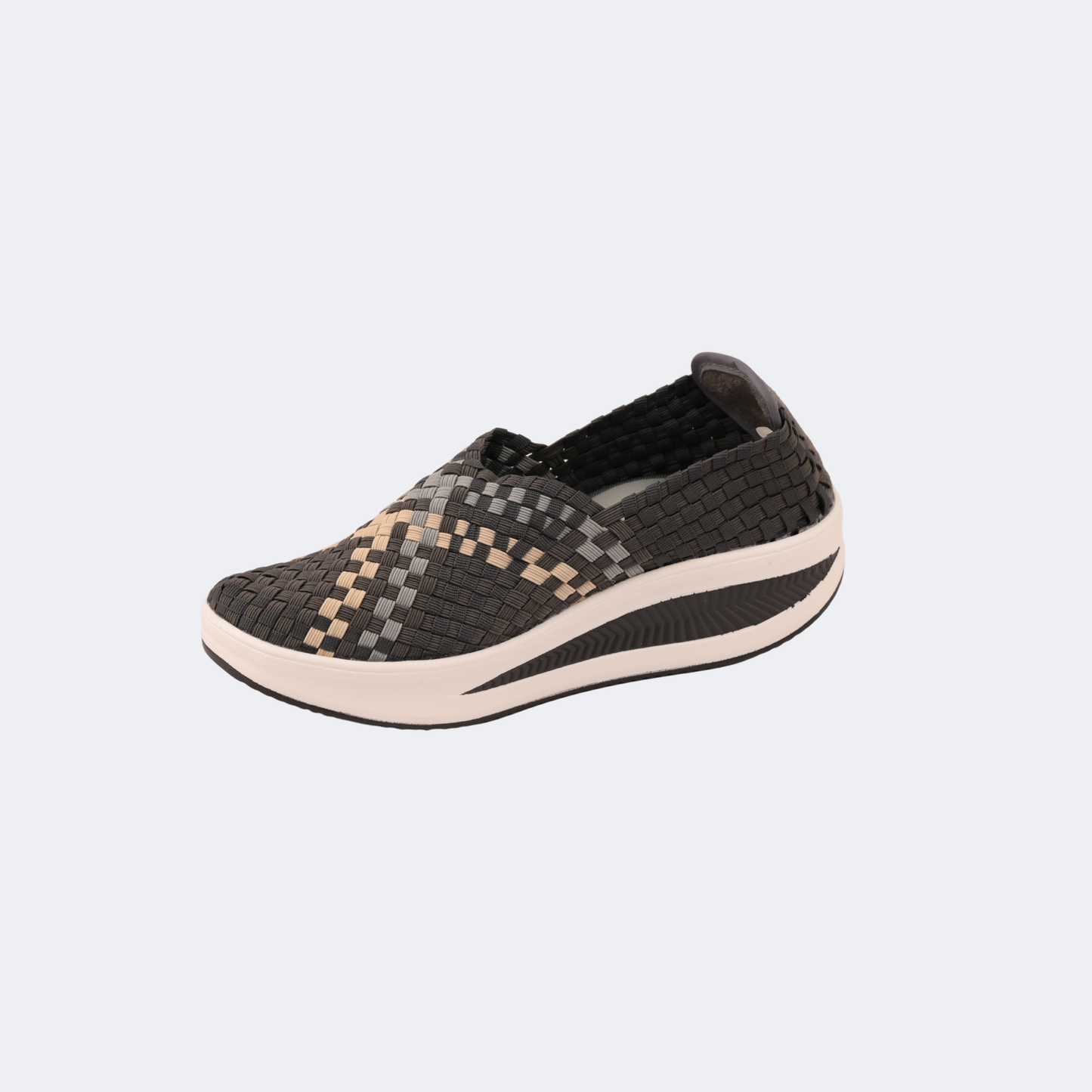 Black and beige woven slip-on shoe on a light gray background | Vogelle