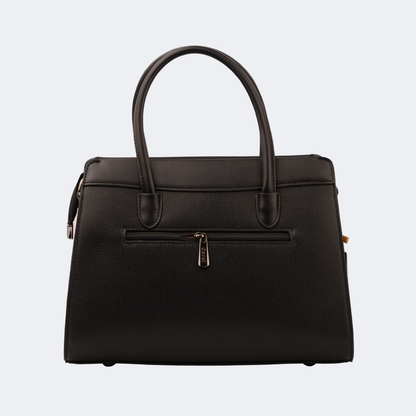 Black handbag with a gold zipper on a light gray background | Vogelle