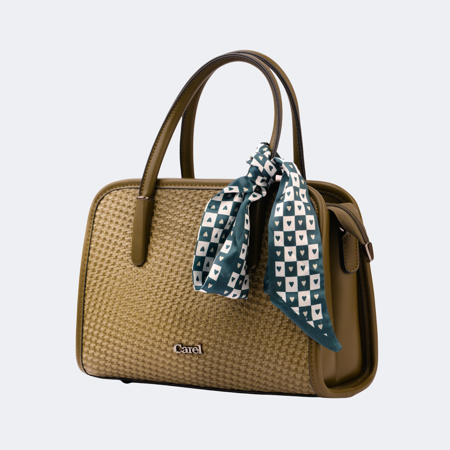 Brown handbag with a blue patterned scarf on a light gray background -Vogelle