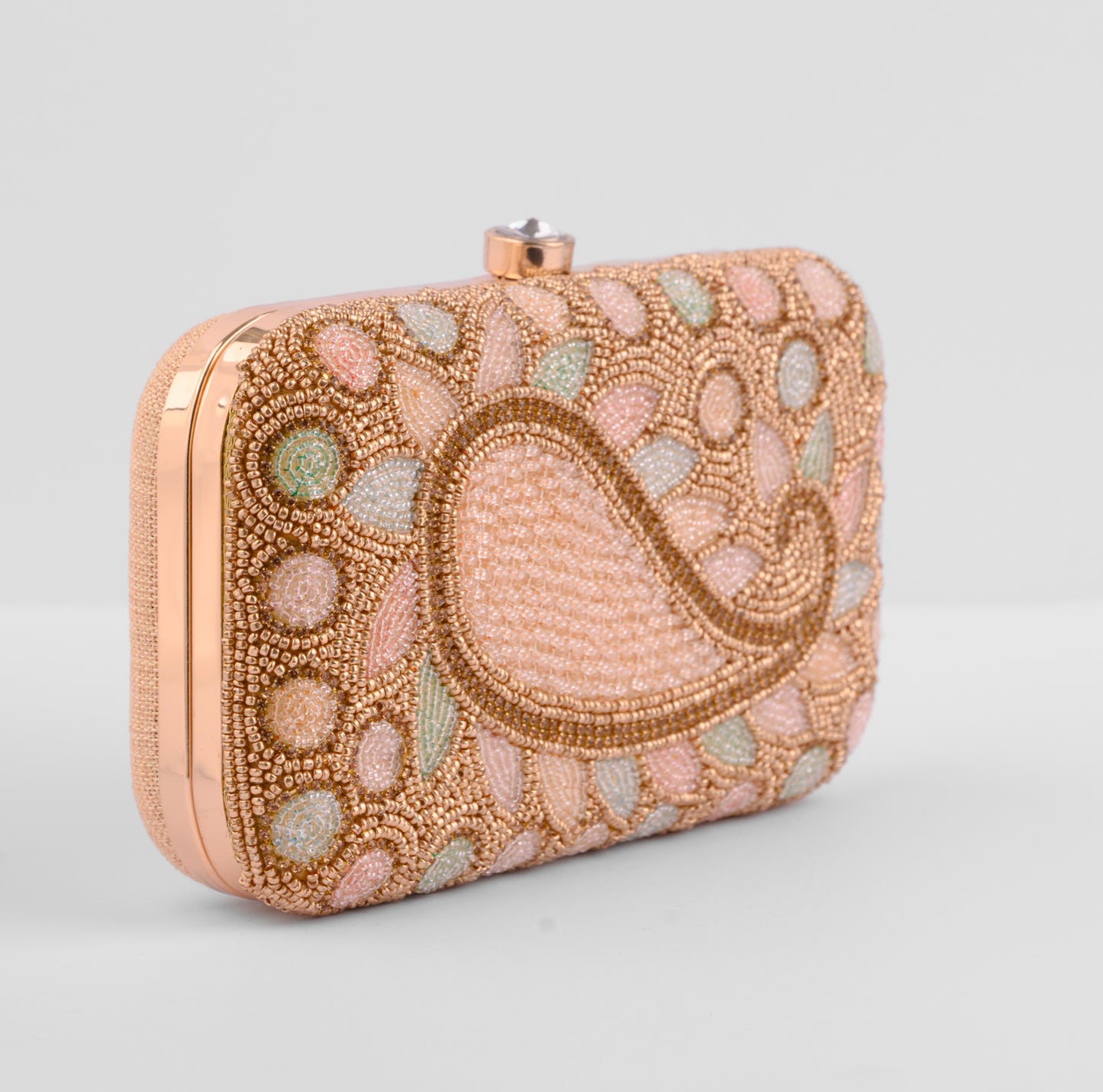 Decorative clutch bag with intricate beadwork on a light gray background | Vogelle