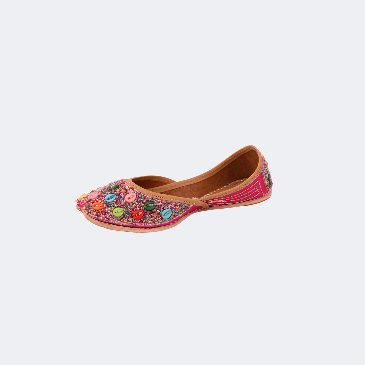 Embroidered flat shoe with colorful designs on a white background | Vogelle