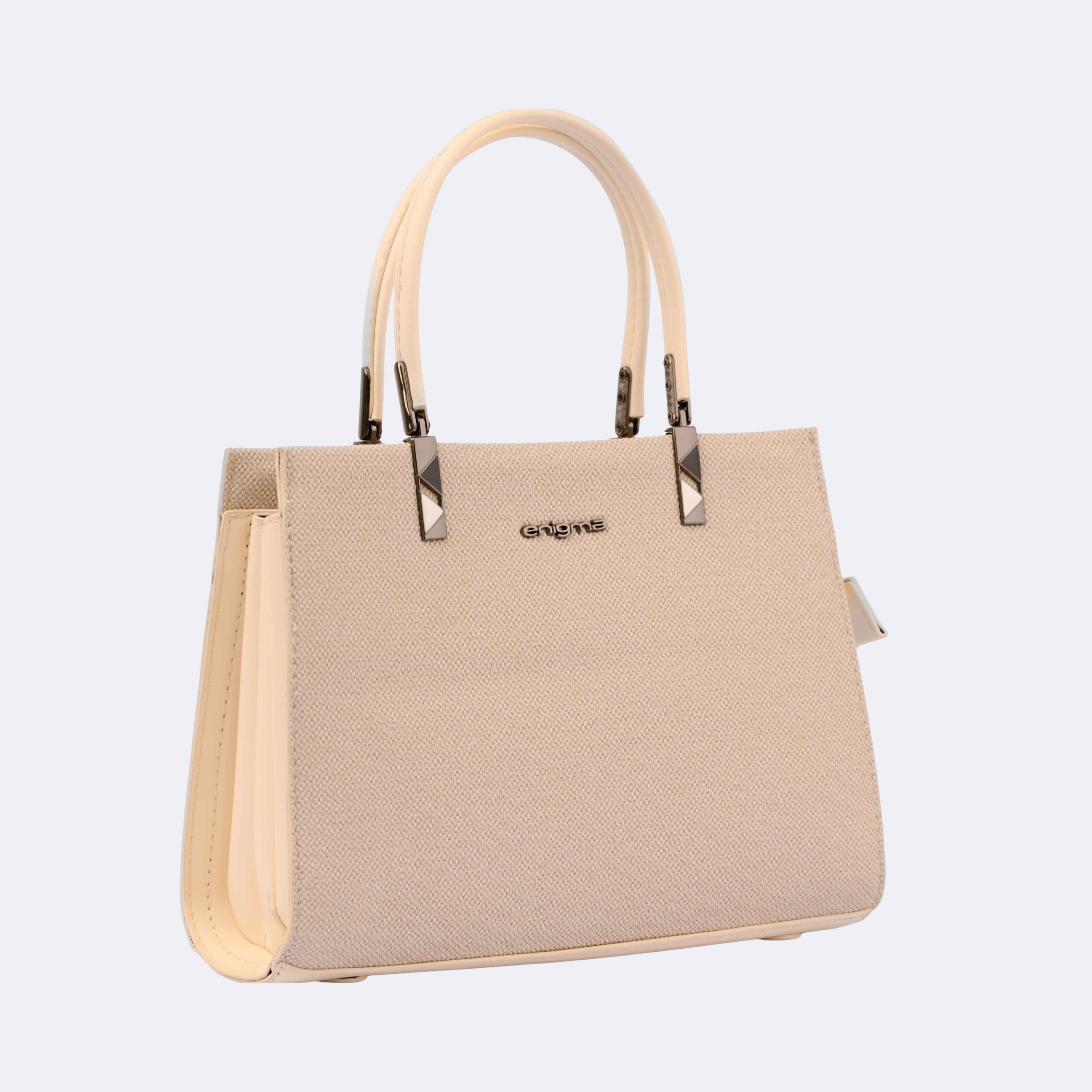 Beige handbag with a visible brand logo on a light gray background | Vogelle