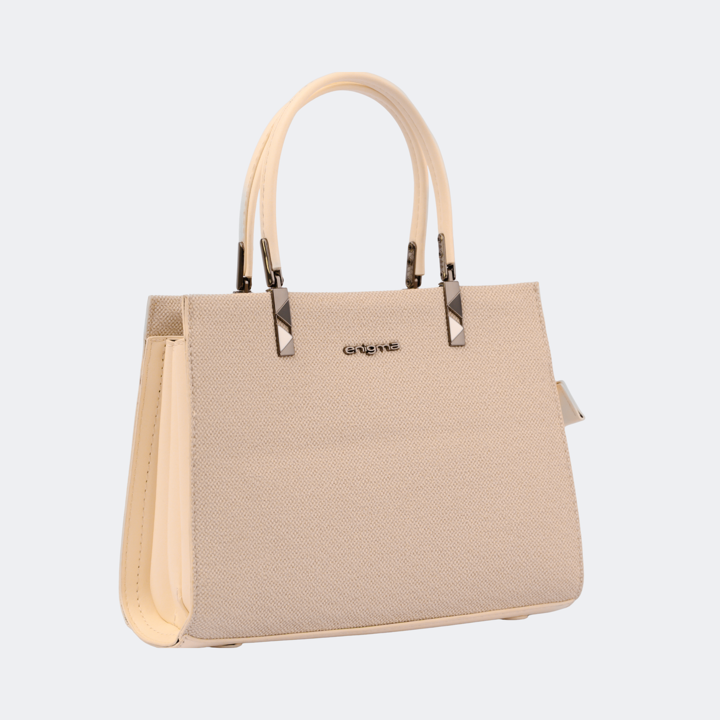 Beige handbag with a visible brand logo on a light gray background | Vogelle