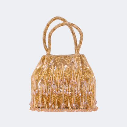Gold beaded handbag on a light gray background | Vogelle
