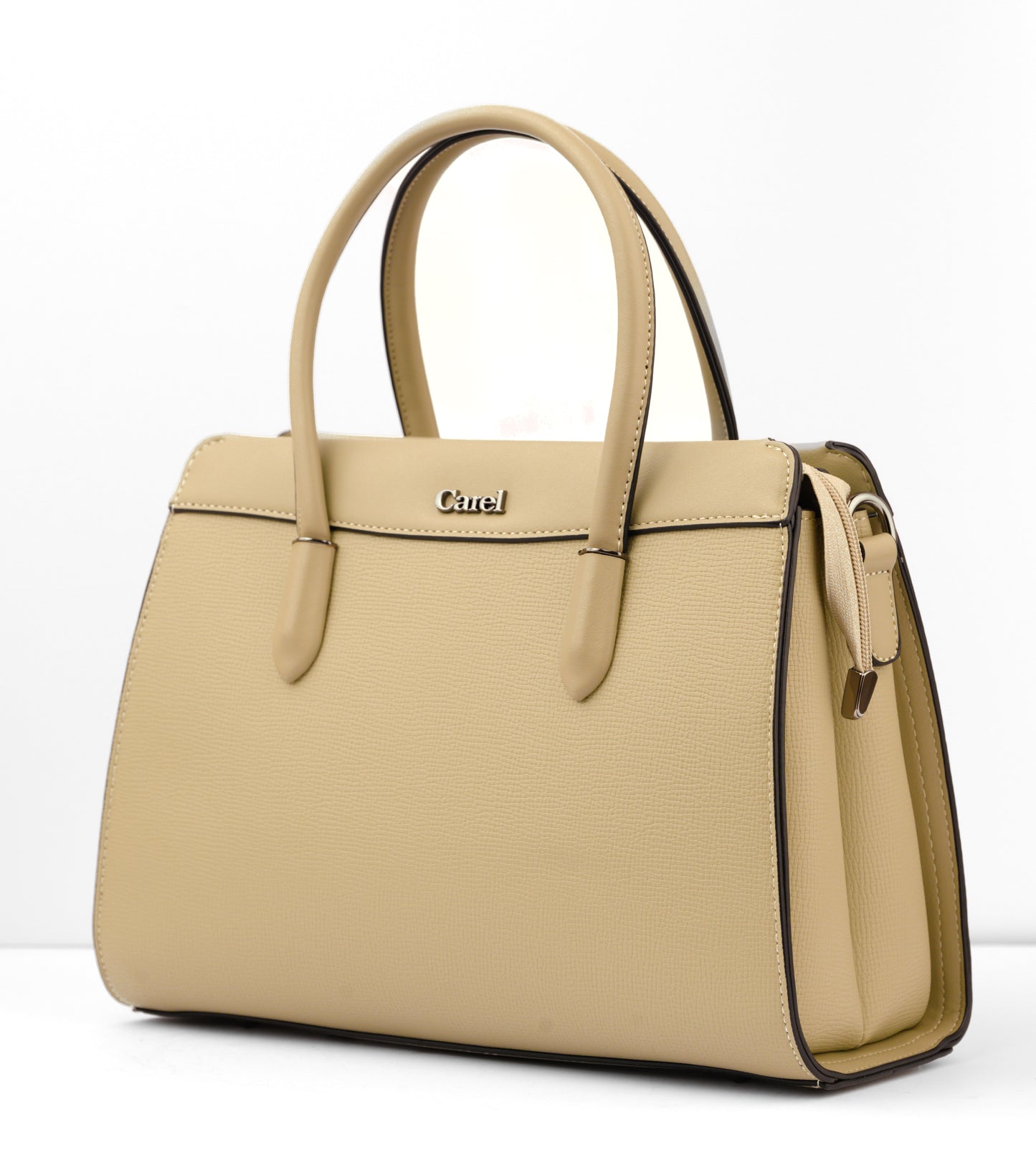 Beige handbag with black accents on a white background | Vogelle
