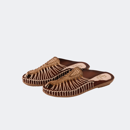 Pair of brown sandals on a light gray background | Vogelle