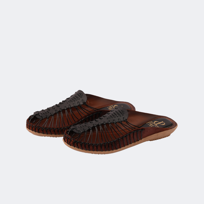 Pair of brown sandals with gray soles on a light gray background | Vogelle
