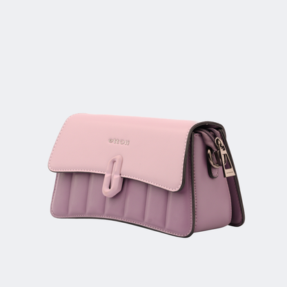 Pink and purple handbag with a visible brand logo on a light gray background | Vogelle