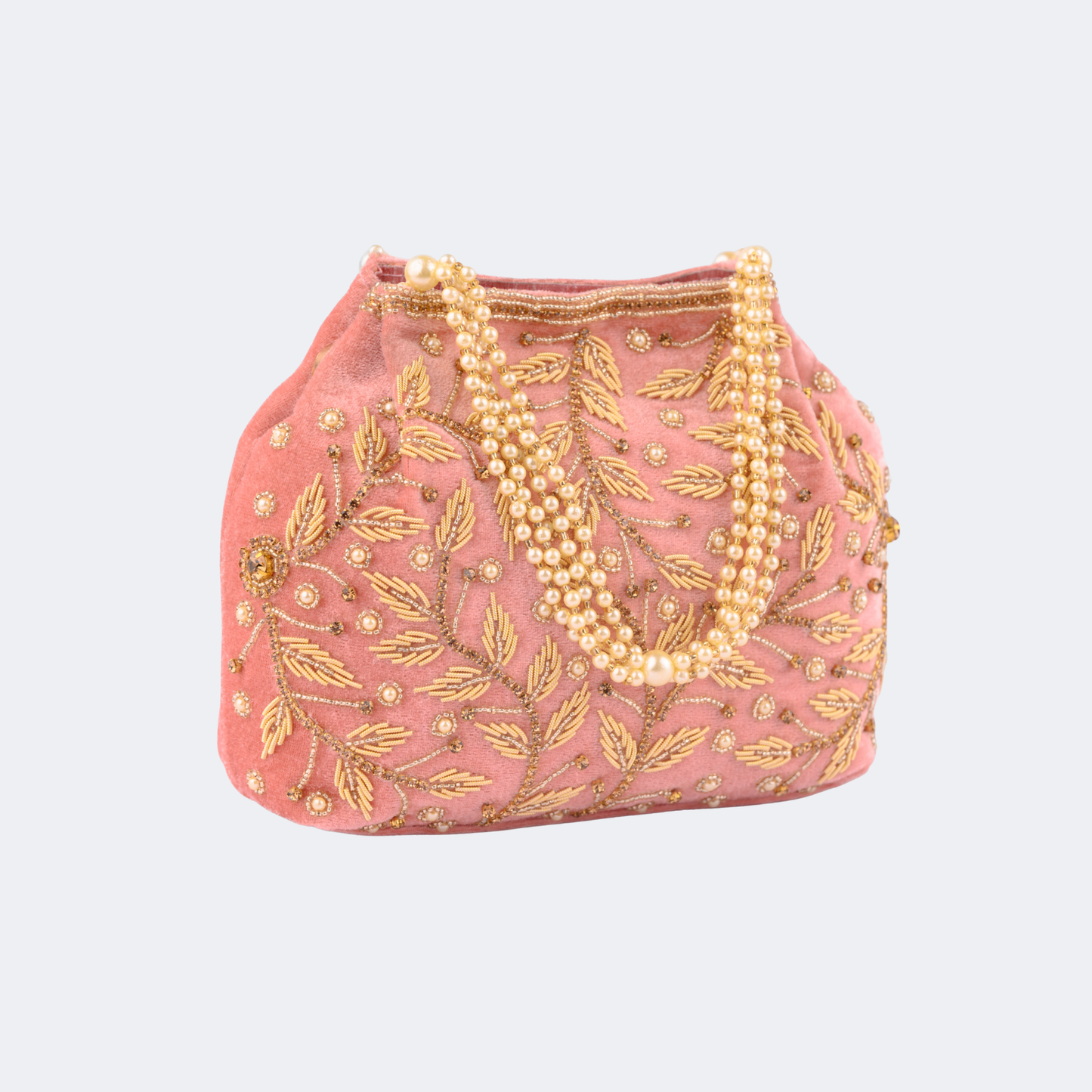 Pink handbag with gold embroidery and pearl strands on a white background | Vogelle
