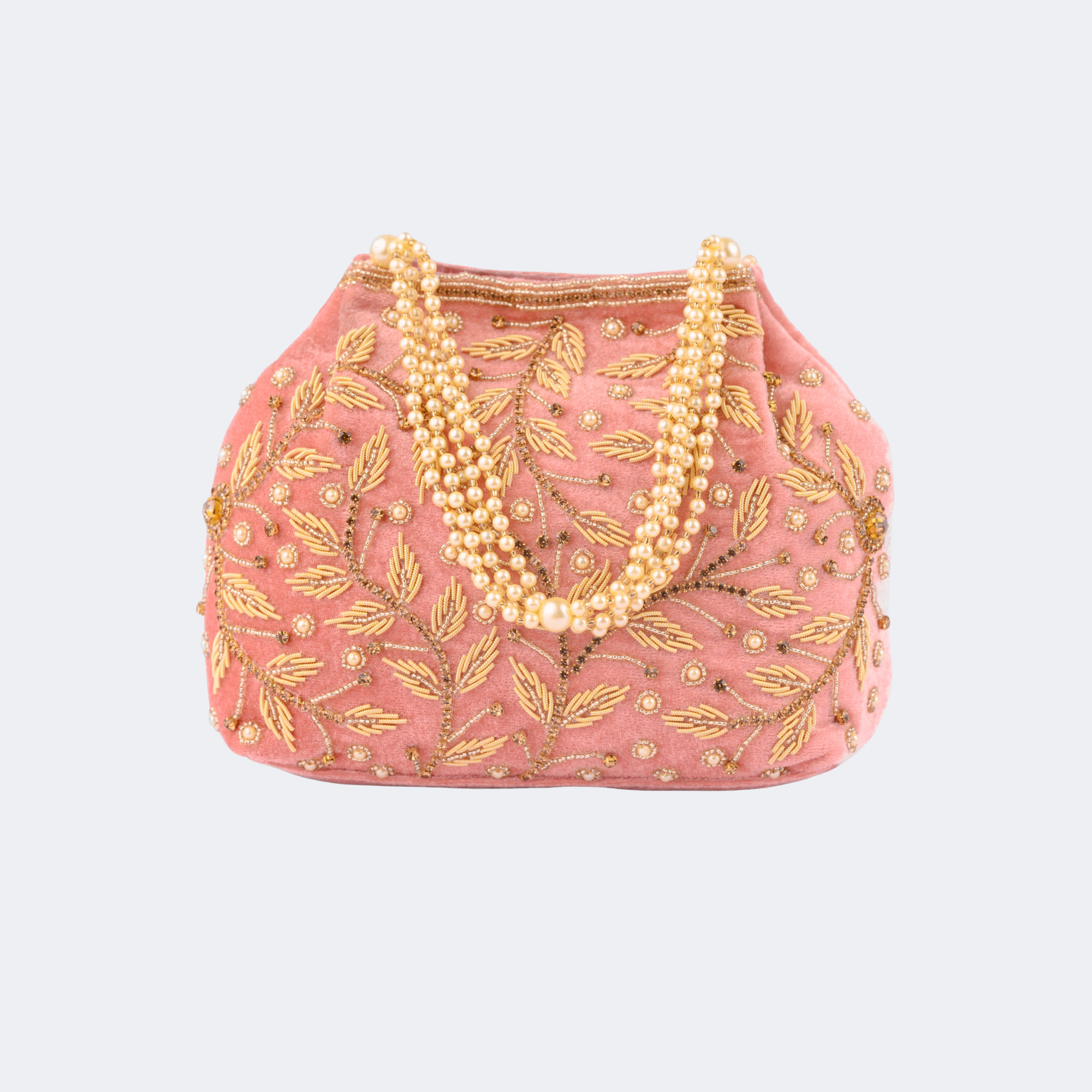 Pink embroidered handbag with gold detailing and pearl strands on a light gray background | Vogelle
