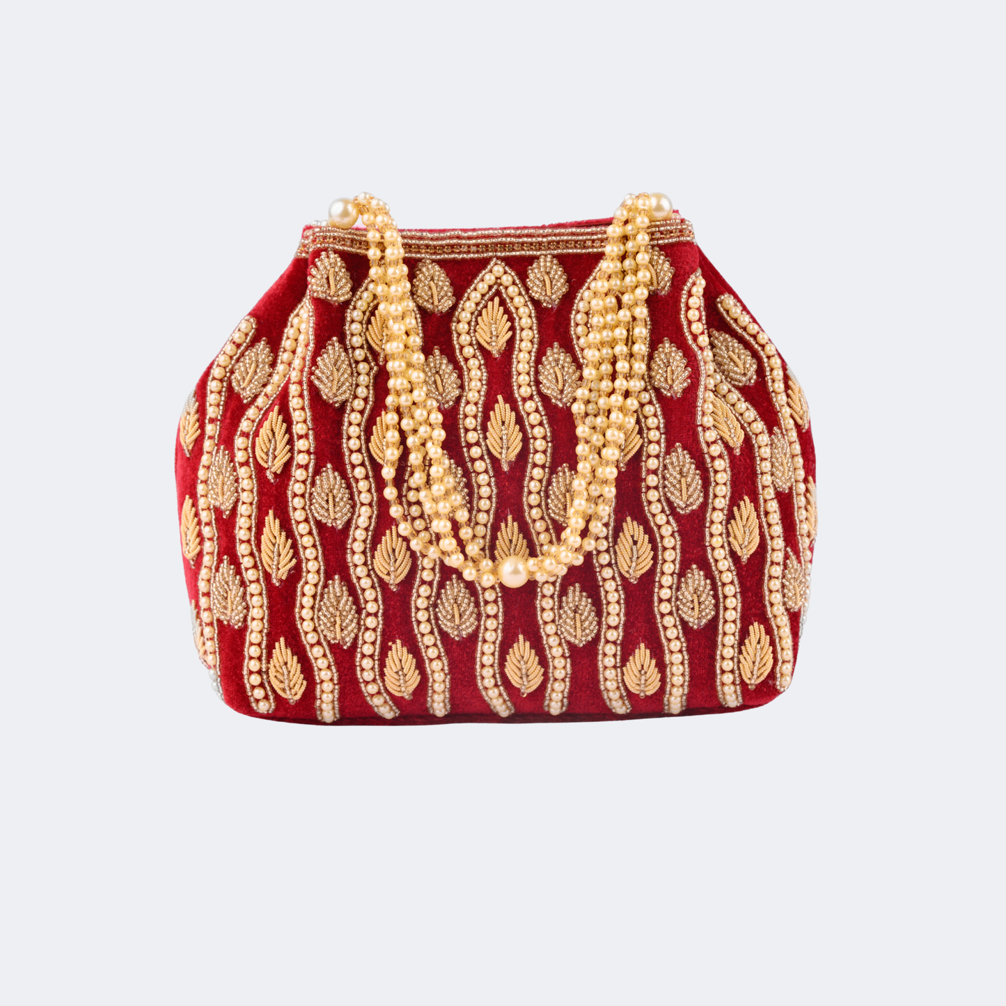 Red handbag with gold embroidery and pearl strands on a white background | Vogelle