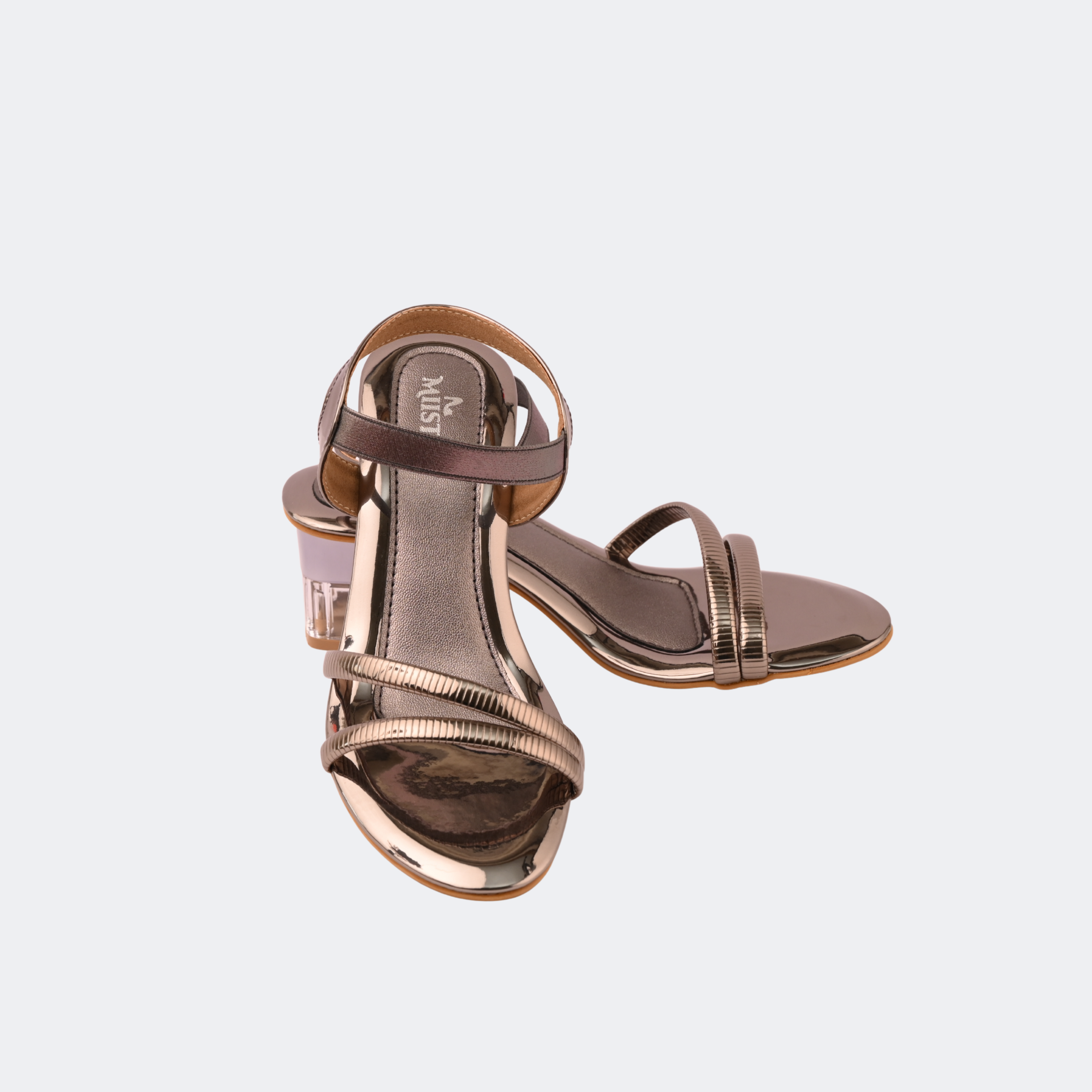 Rose gold high-heeled sandals on a light gray background | Vogelle