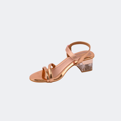 Rose gold sandal with clear block heel on a light gray background | Vogelle