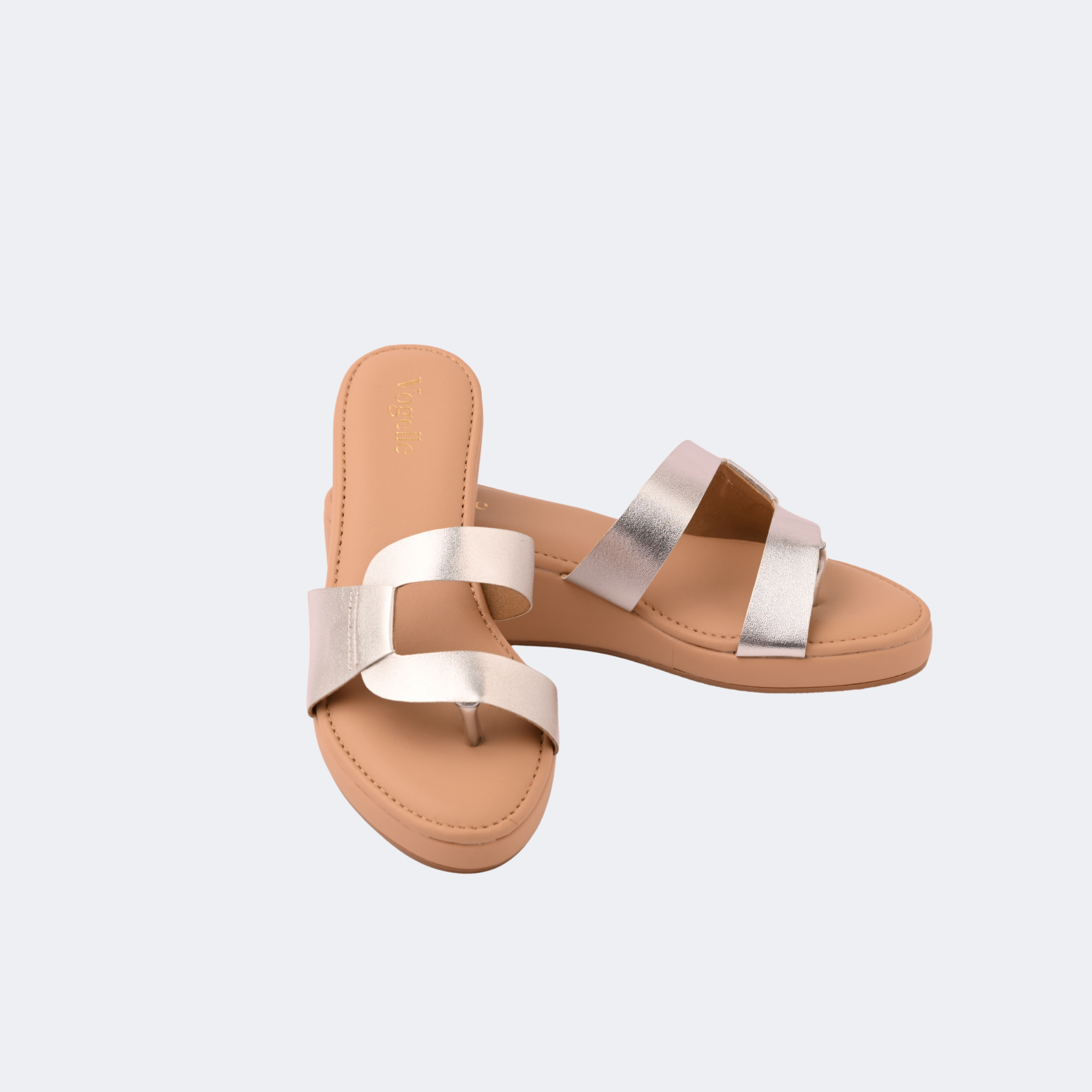 Tan sandals with silver straps on a light gray background | Vogelle