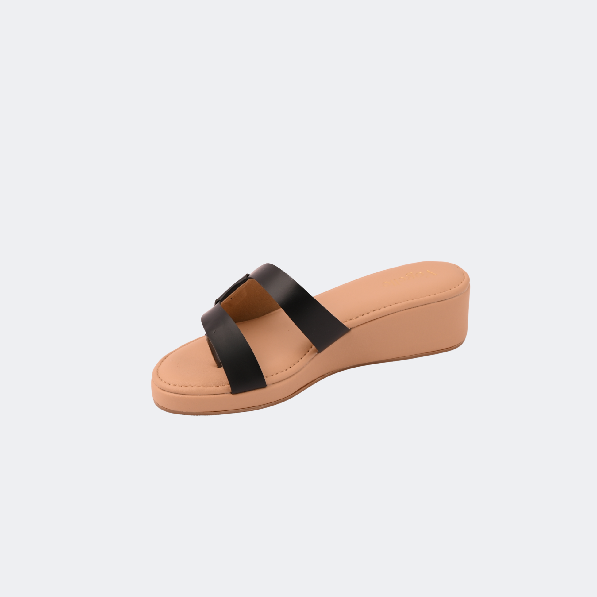 Tan wedge sandal with black straps on a light gray background | Vogelle